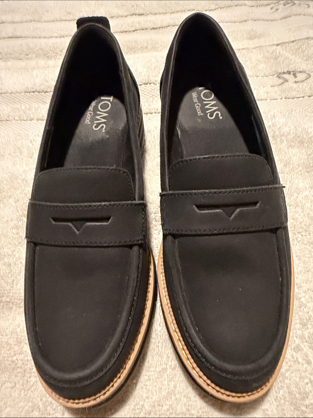 TOMS Black Men’s Penny Loafers with Tan Trim